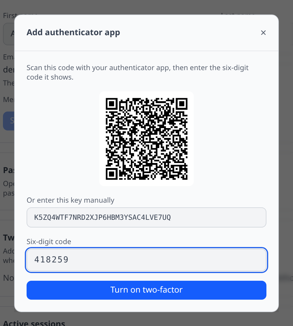 Add authenticator app dialog showing the QR code, manual setup key, and six-digit code field