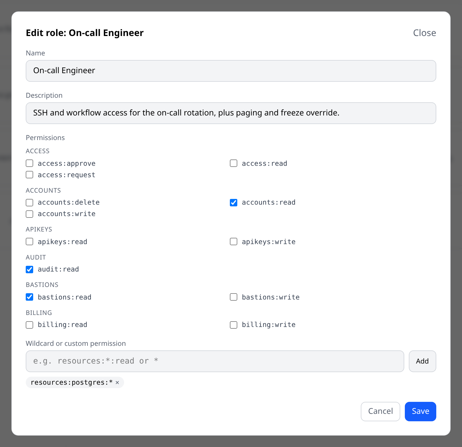 Custom-role edit form with permissions grouped by category, wildcard input visible