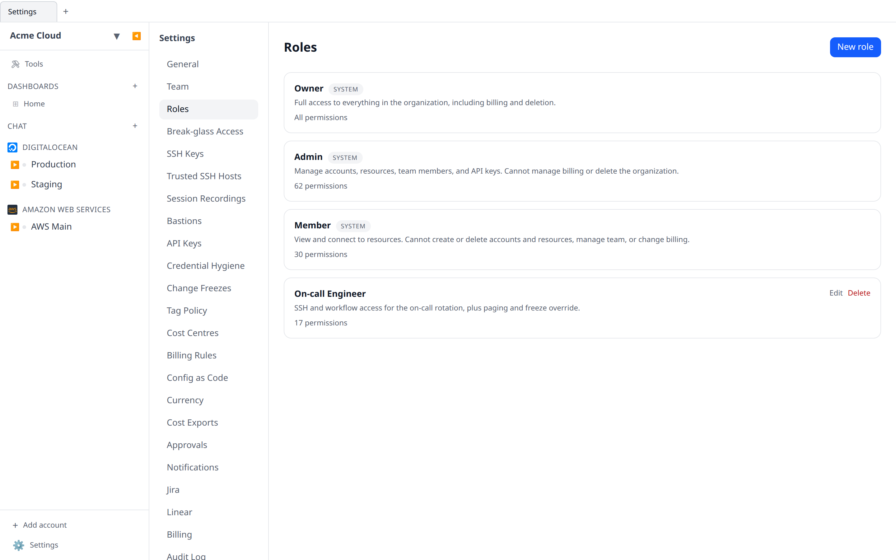 Settings → Roles page showing the three system roles plus one custom role